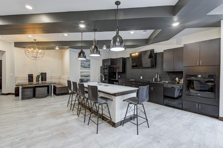 Kitchen area in modern apartment clubhouse.