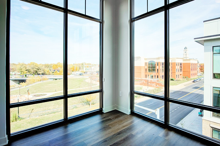 When choosing a floor plan, consider the amount of natural light. This unit at East Bank Apartments offers plenty of light and beautiful views from floor-to-ceiling windows.