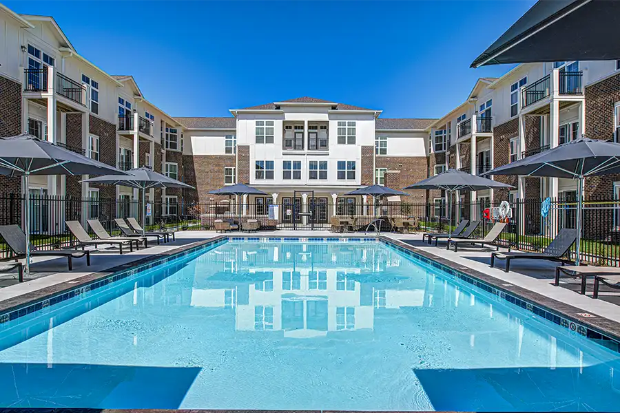 Not sure what a community means by amenities? This pool at North Haven Apartments is one example of an amenity. Pristine pool surrounded by apartment buildings at North Haven Apartments.